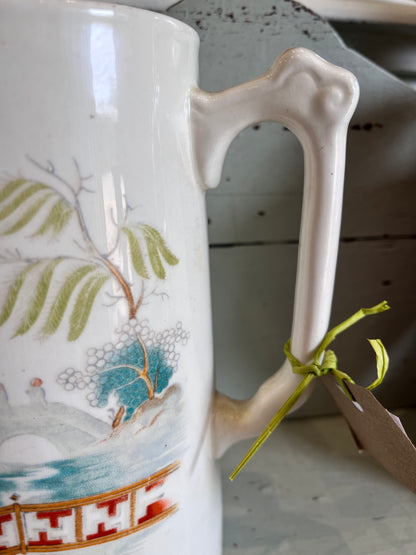 Coloured  Earthenware Willow Pattern Jug